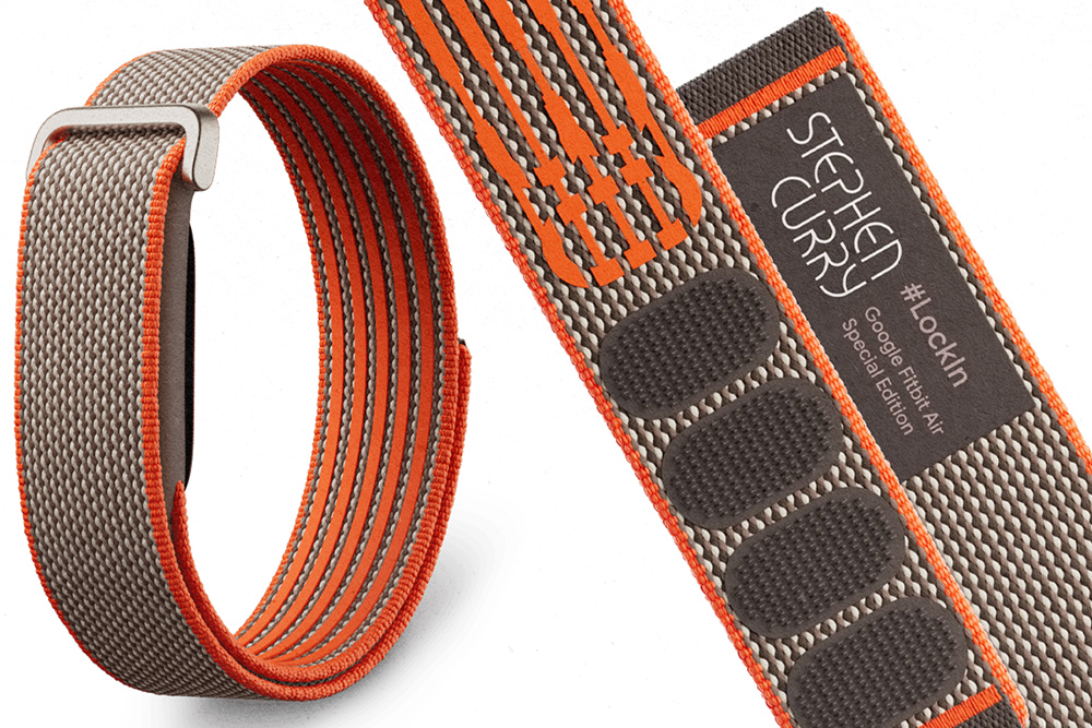 An image of an orange and brown wristband fitness tracker with the words "Stephen Curry" on the inside.